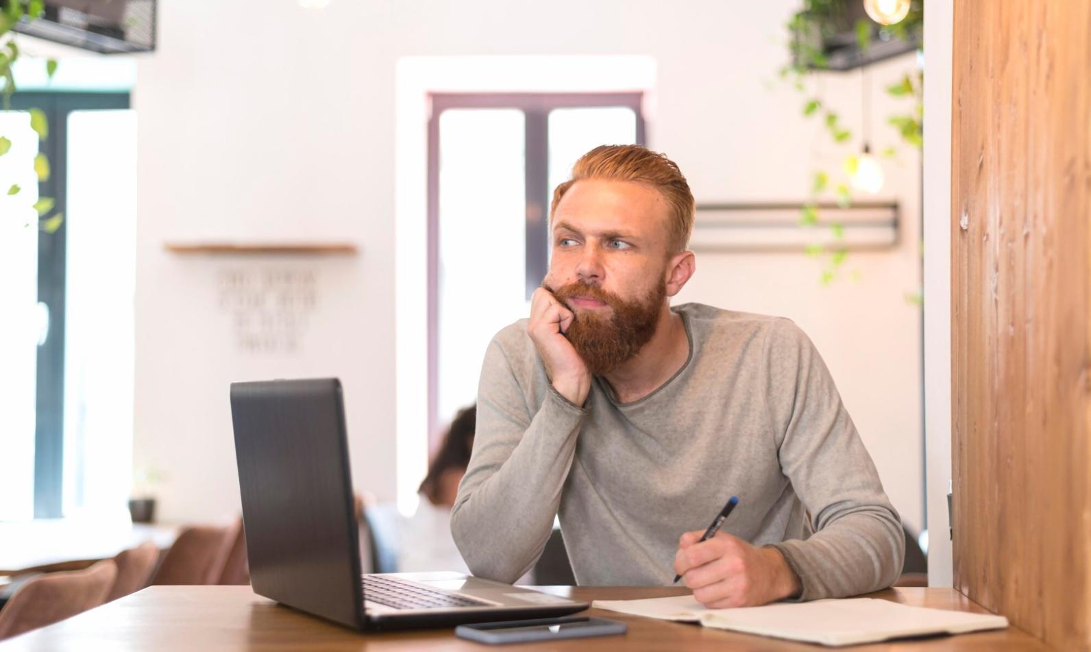 Professional budget analysis workspace with financial documents and planning materials